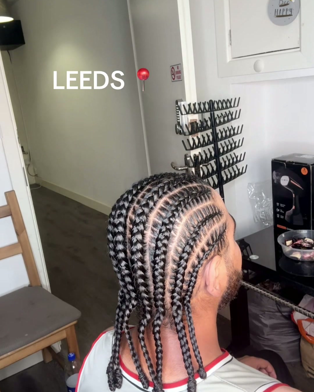 Men's cornrows with neat straight-back partings styled at the Leeds studio