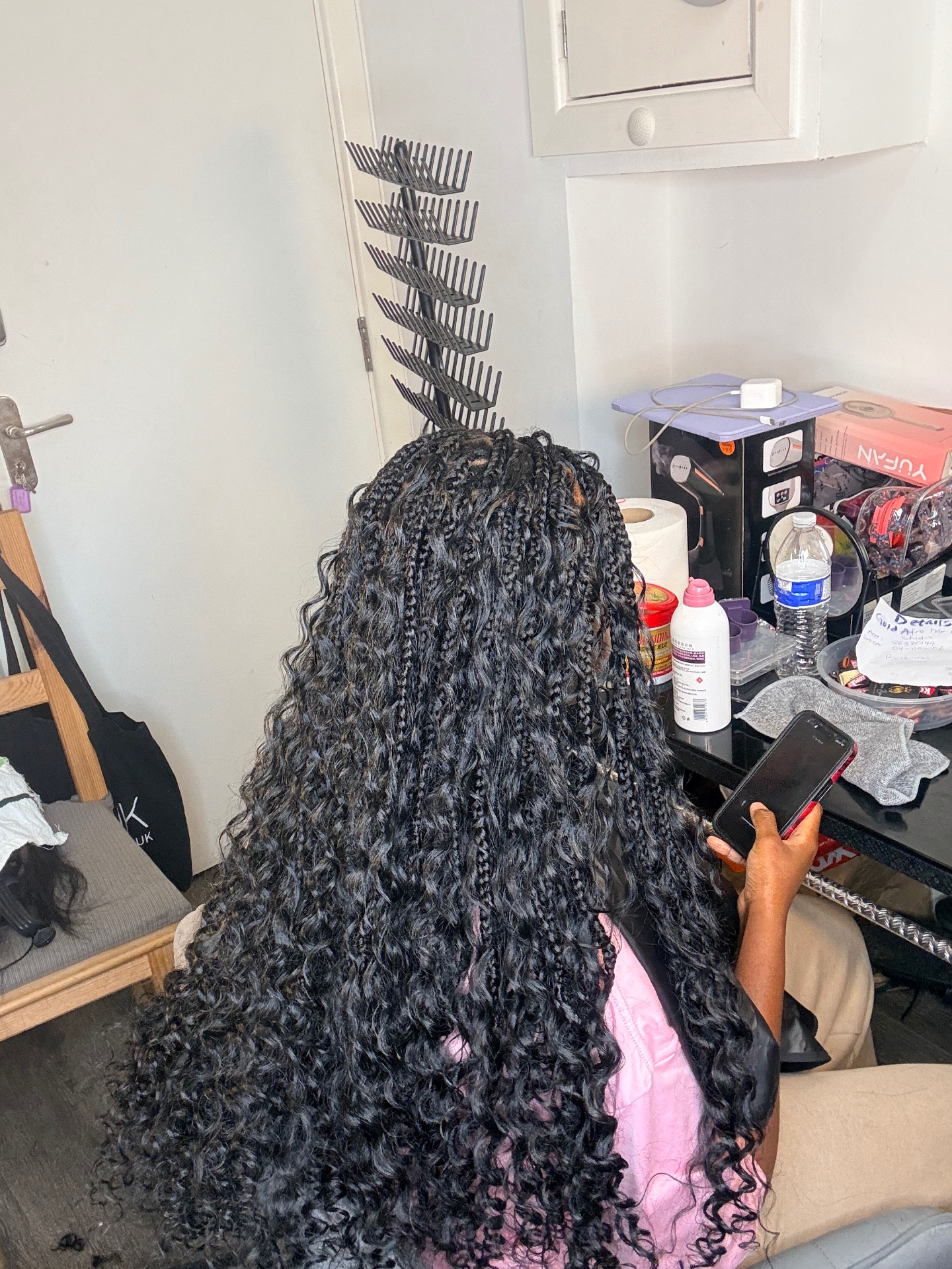 Full-length boho braids with soft curly hair throughout