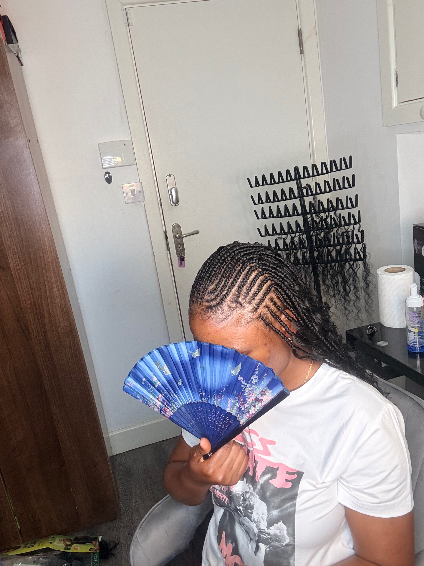 Fulani feed-in braids with curly ends styled at the Leeds studio