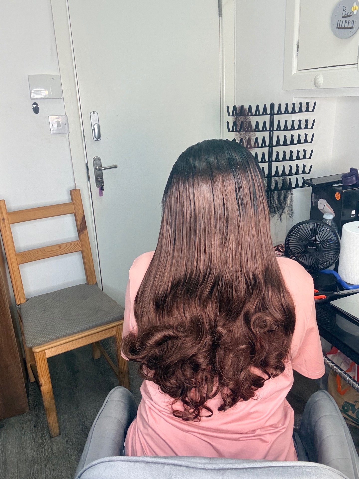 Sew-in leave out with long, flowing hair styled at the Leeds studio