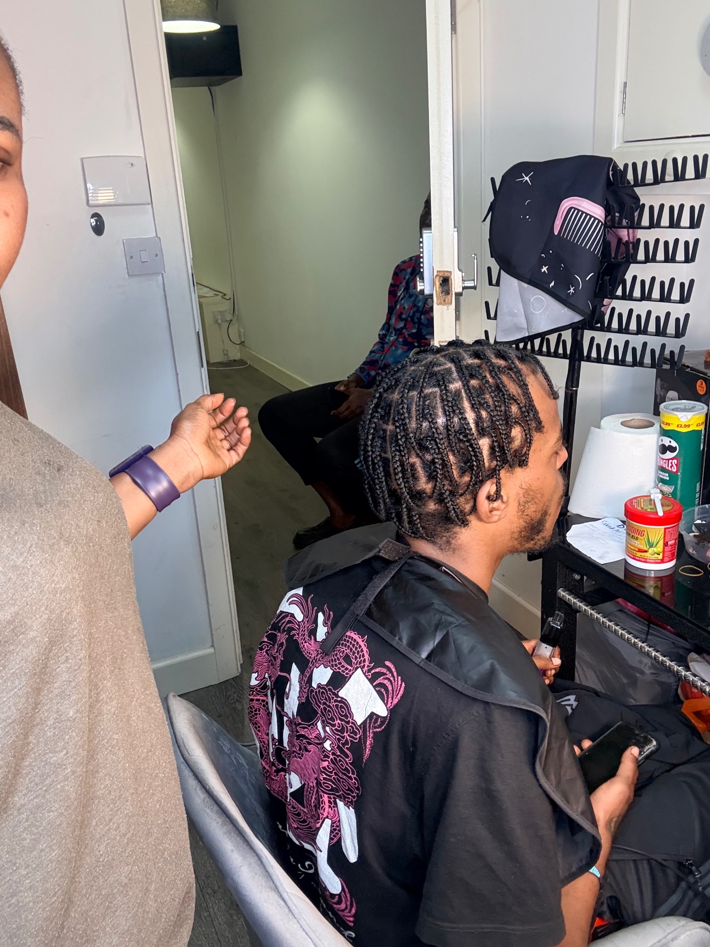 Men's braids in progress at the Leeds studio