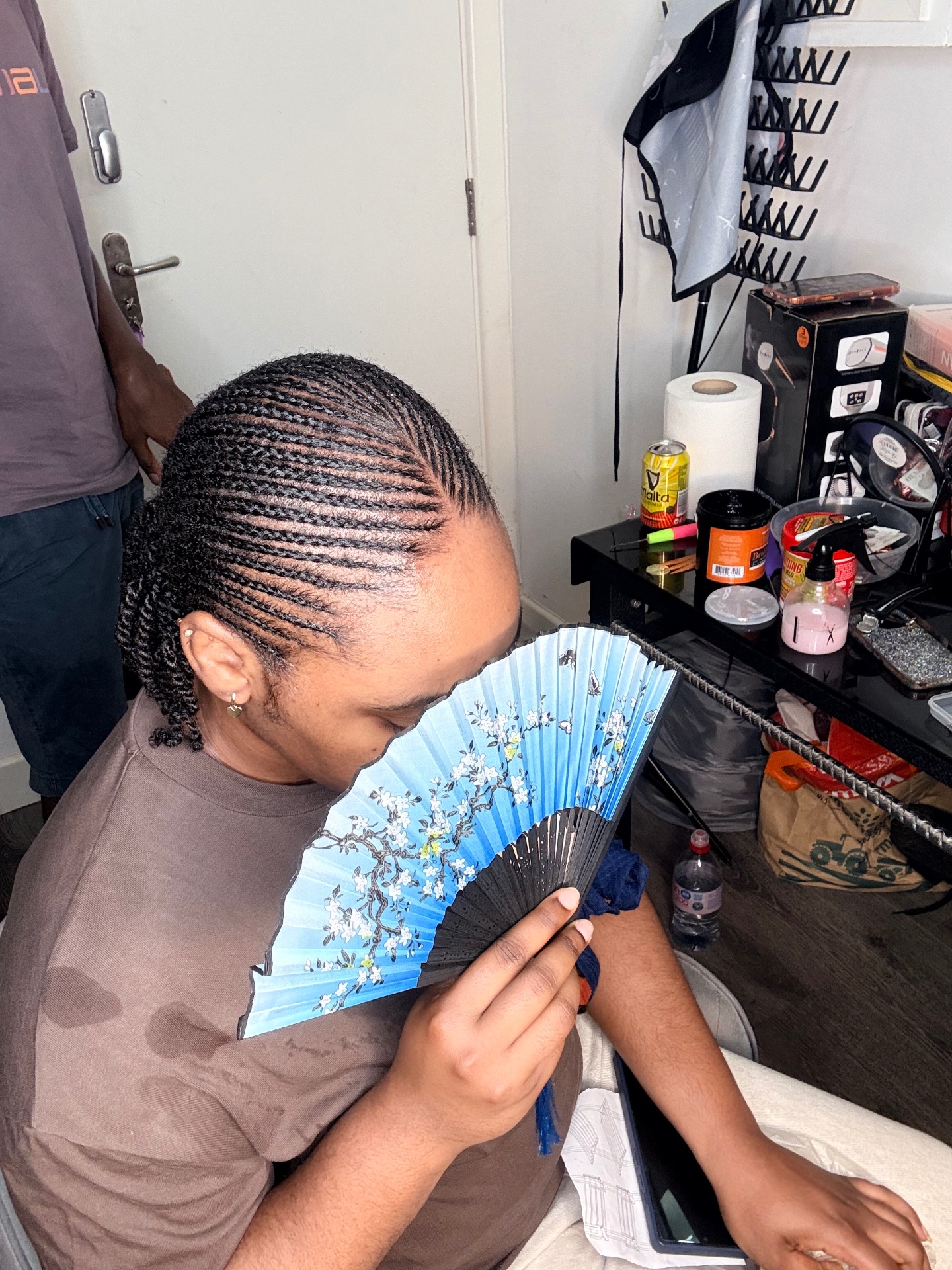 Neat feed-in cornrows with clean partings styled at the Leeds studio